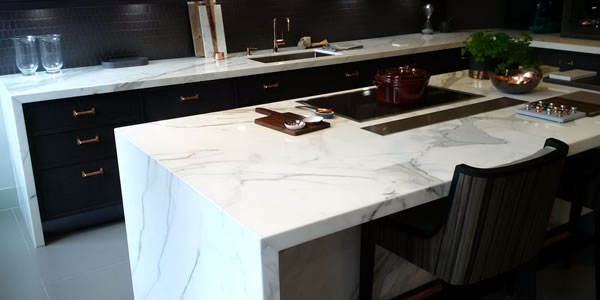 Kitchen with bookmatched Calacatta Oro