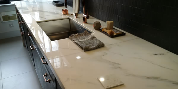 Kitchen with bookmatched Calacatta Oro