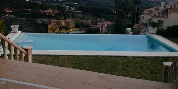 Classy use of stone for infinity pool